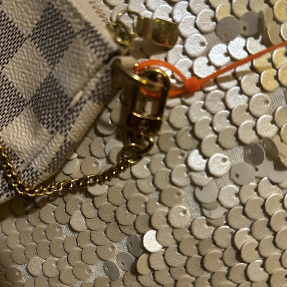 - Mini logo Louis Vuitton authentication - Picture 4 of 5